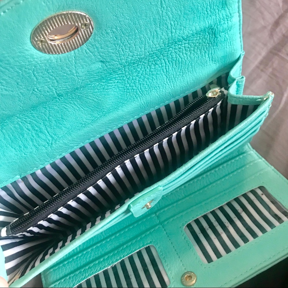 Slightly used teal wallet